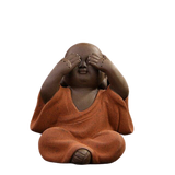 statue de bouddhiste orange