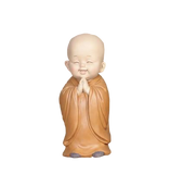 statue de bouddha chauve debout