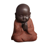 statue bouddha rouge rieur