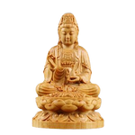 statue bouddha assis en bois sur fond blanc