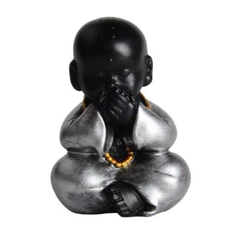 statue enfant bouddha sur fond blanc