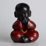 statue enfant bouddha rouge