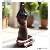 statue chat bouddha bras en l'air