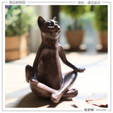 statue chat bouddha en position de lotus
