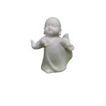 petit bouddha statuette sur fond blanc 