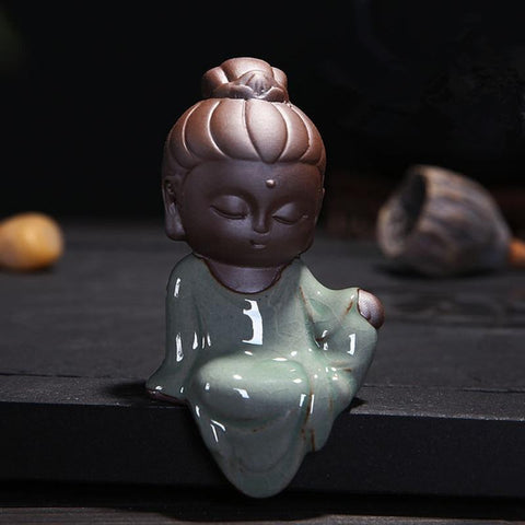 statue bouddha méditation bleu coiffé