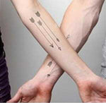 tatouage bouddha les flèches de la sagesse sur un bras