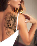 tatouage le lion de bouddha sur une homoplate
