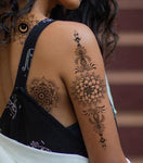 tatouage mandala bouddha sur un bras